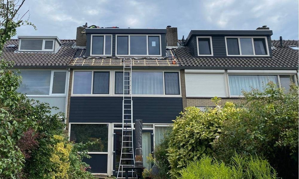 Wat kost een plat dak herstellen in Leek?